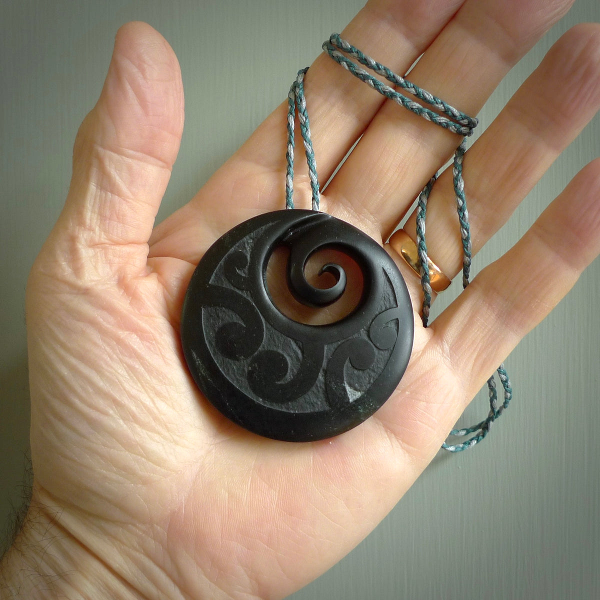 Carved sale stone pendant