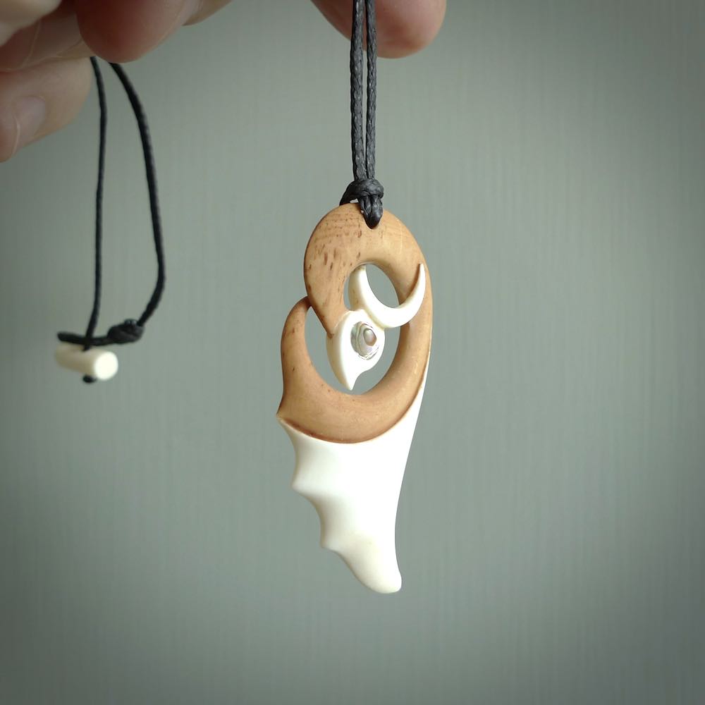 HAND CARVED BONE CONTEMPORARY PENDANT. STAINED BONE ART TO WEAR. – NZ  Pacific