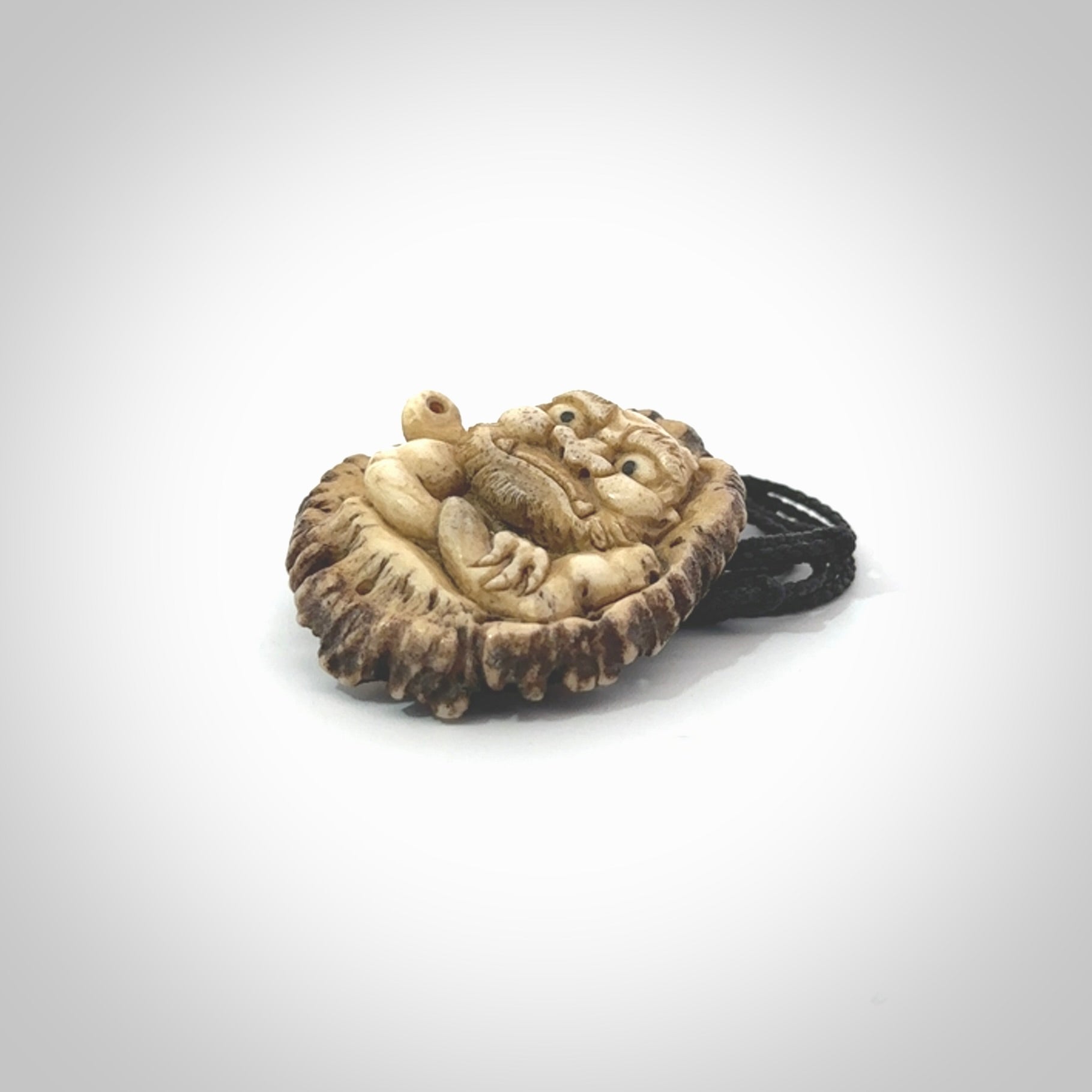 Hand carved ONI NI KANABO Pendant. Made from Red Deer antler in New Zealand. Unique Japanese necklace hand made from deer antler by master bone carver Fumio Noguchi. Spectacular collectable work of art, made to wear. One only pendant, delivered to you at no extra cost with express courier.