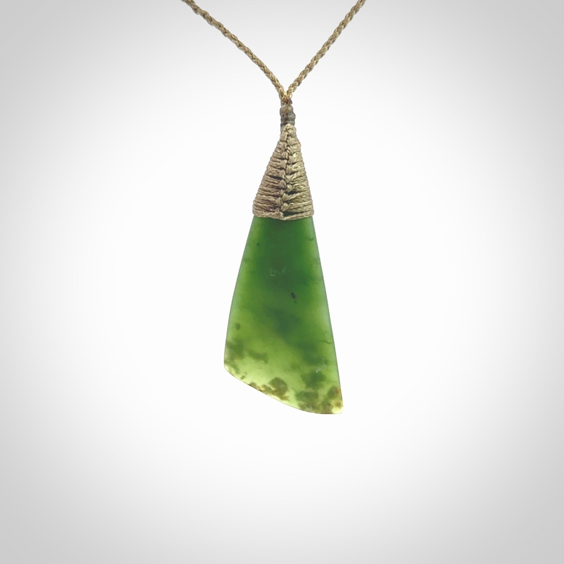 One only medium sized New Zealand jade drop pendant. Hand carved in New Zealand by Ric Moor, jade artist, for NZ Pacific.