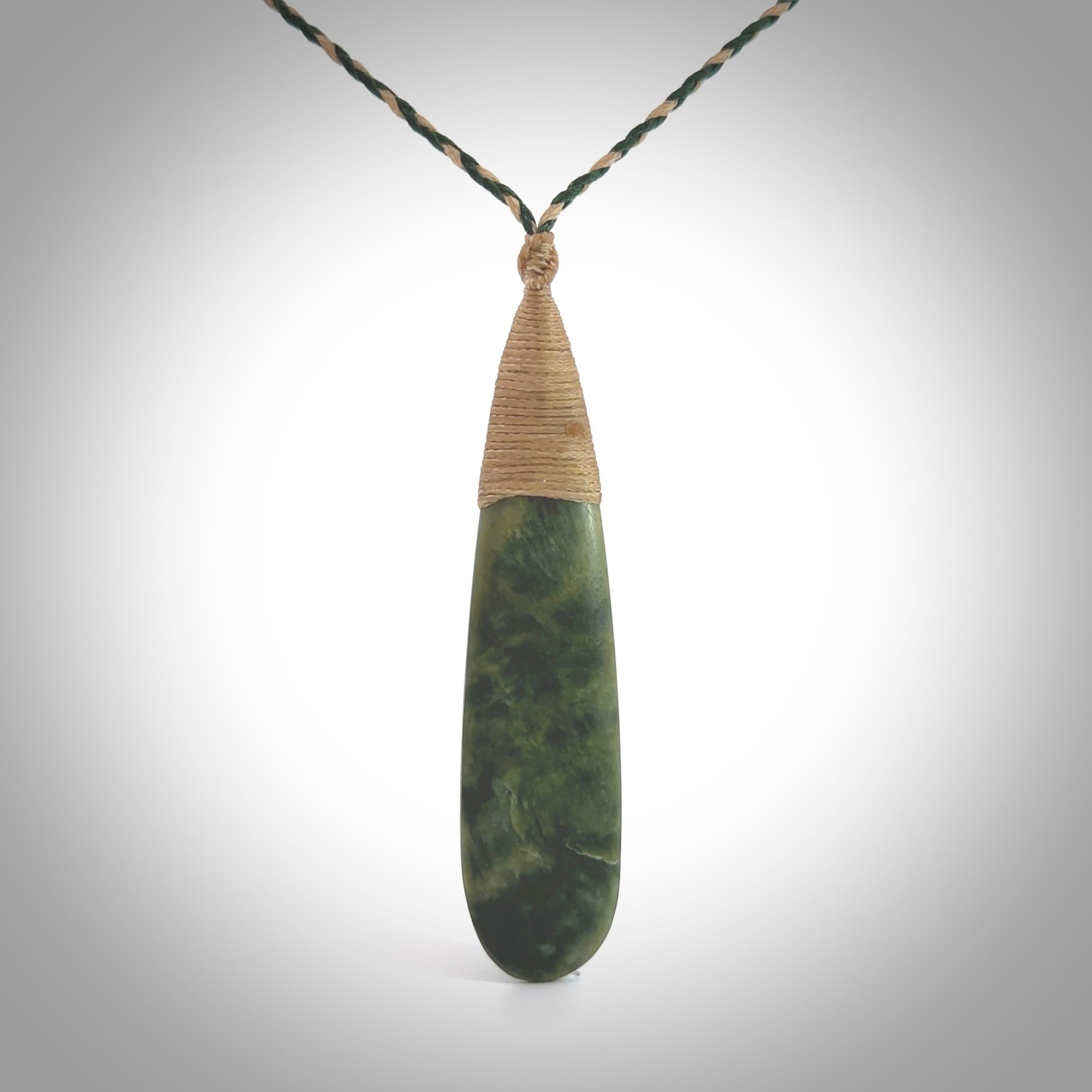 New Zealand flower jade drop pendant. Hand carved in New Zealand by NZ Pacific. Large New Zealand Jade roimata drop necklace. Drop pendant representing healing, comfort and compassion. Unisex pendants for lovers of Jade art to wear.