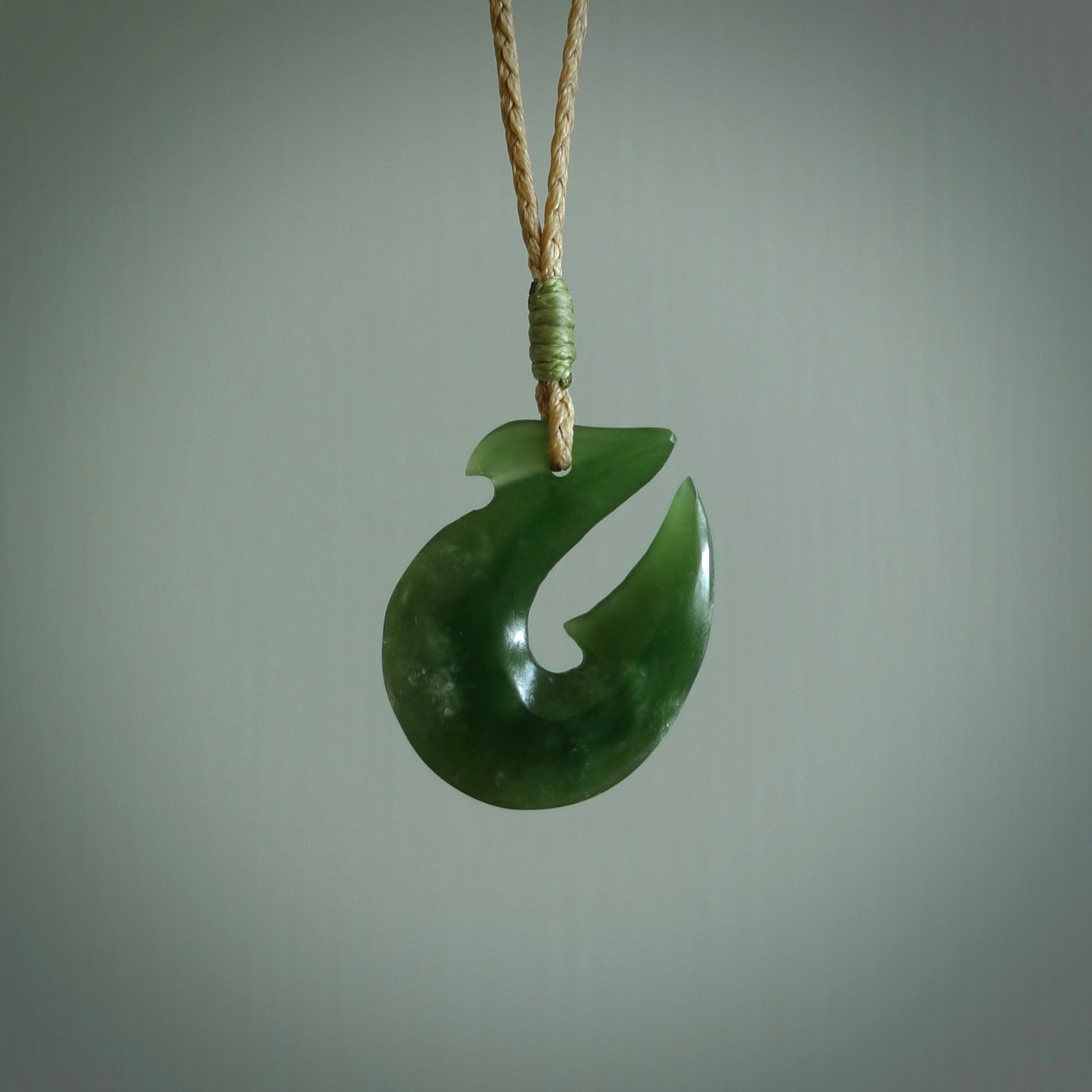 Hand carved New Zealand Jade Hook Pendant. Maori matau necklace hand carved.