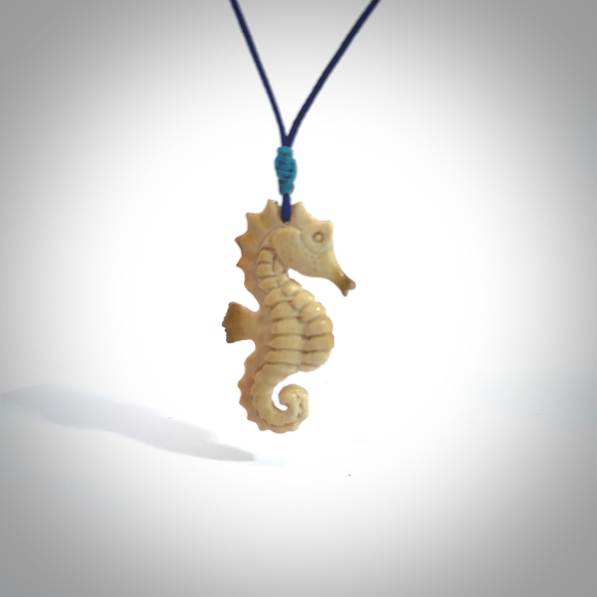 This little pendant is a beautifully carved seahorse pendant made from ancient woolly mammoth tusk. We have designed this so that it can be worn as a pendant, or as a little charm. Made by NZ Pacific and for sale worldwide on our website. Free Postage wherever you are.