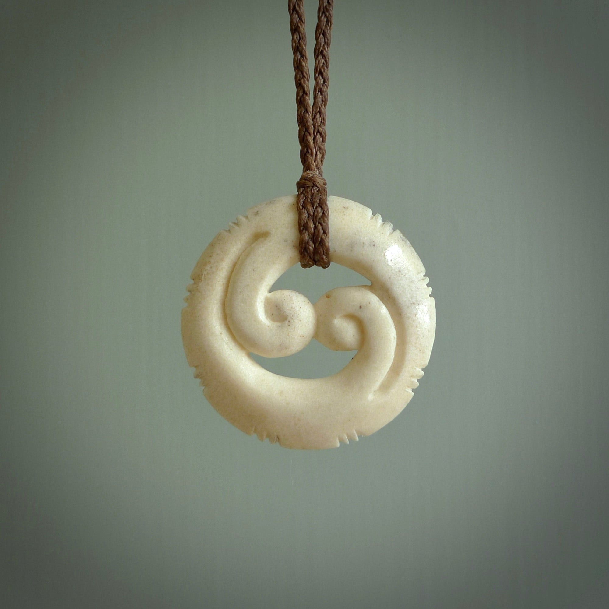 This is a wonderful, etched koru from Deer Antler. Hand carved by Anthony Bray-Heta. Order yours now on NZ Pacific at www.nzpacific.com