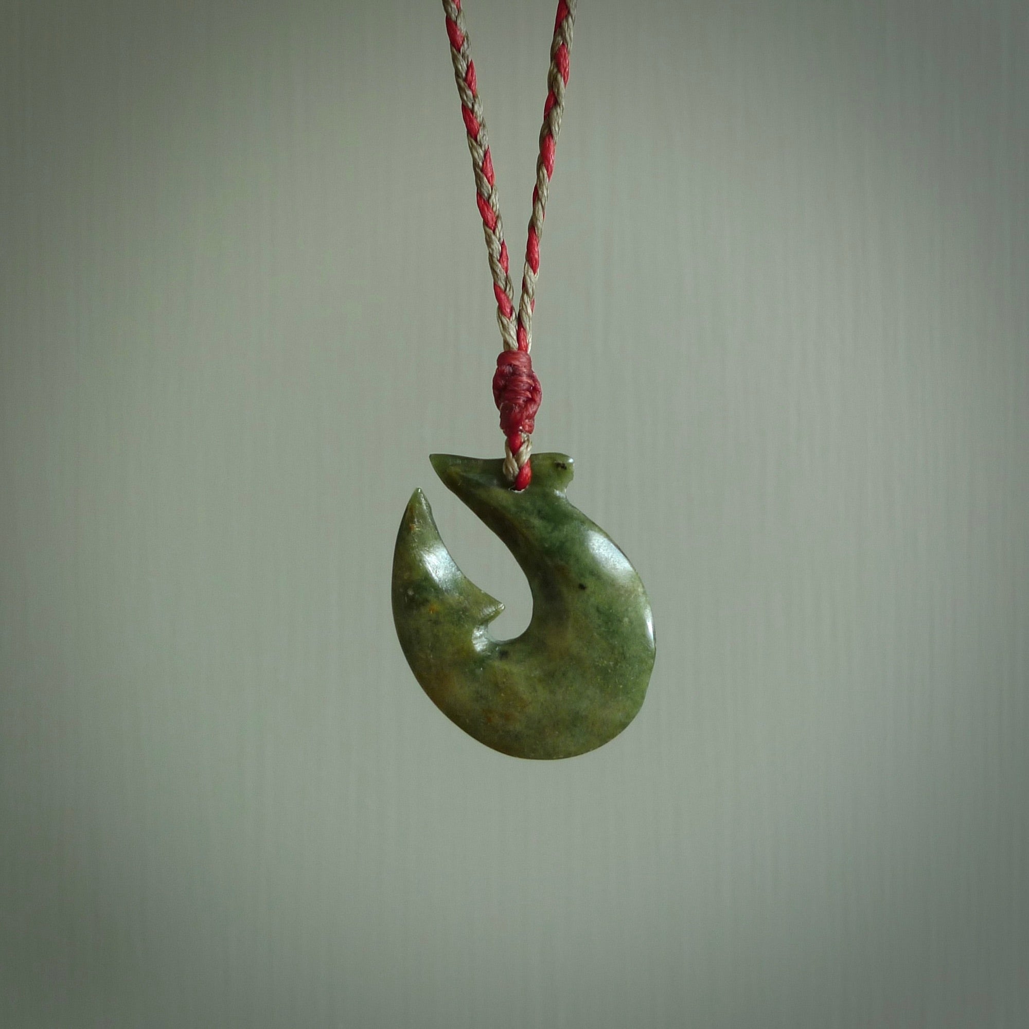 Hand carved New Zealand Jade Hook Pendant. Maori matau necklace hand carved.