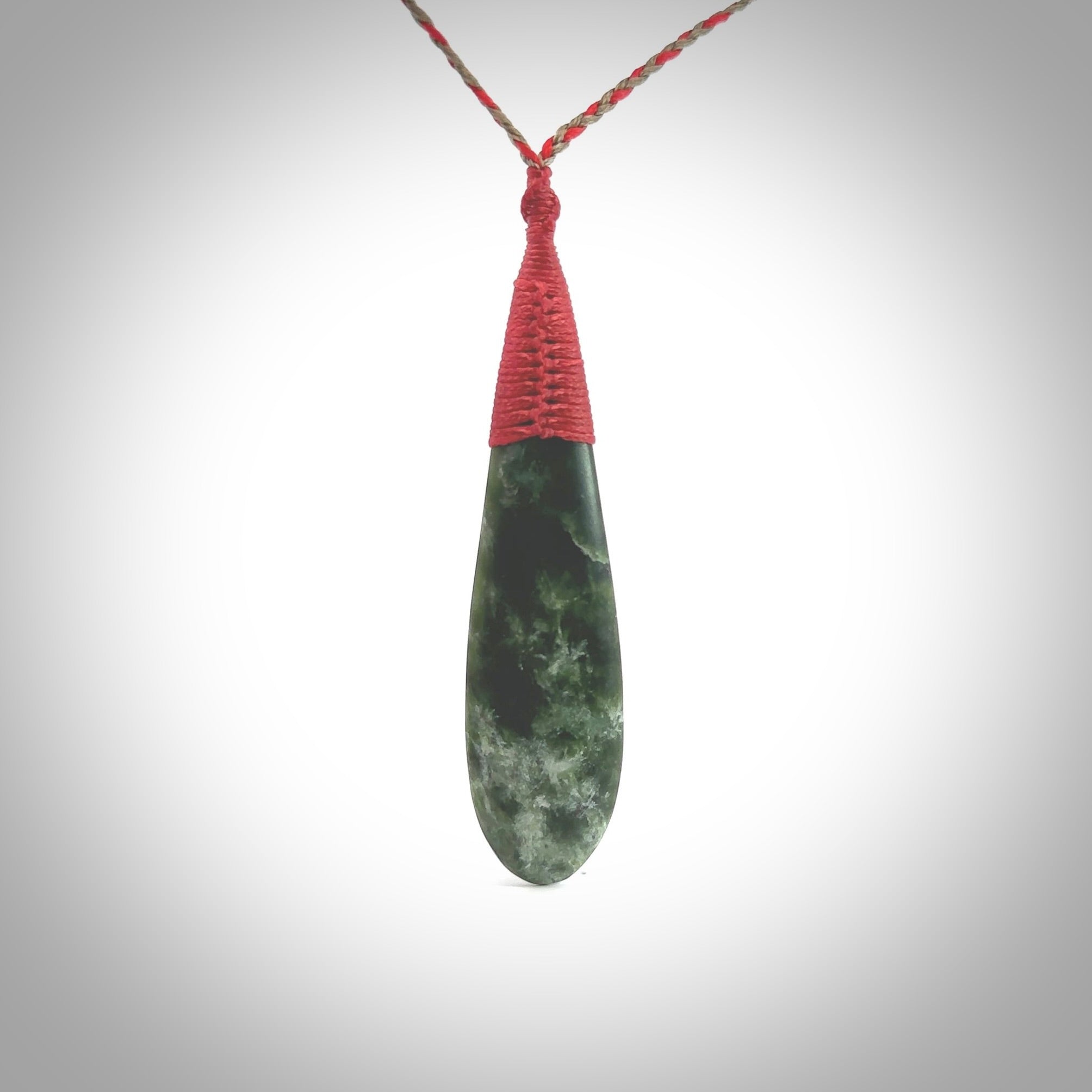 New Zealand flower jade drop pendant. Hand carved in New Zealand by NZ Pacific. Large New Zealand Jade roimata drop necklace. Drop pendant representing healing, comfort and compassion. Unisex pendants for lovers of Jade art to wear.