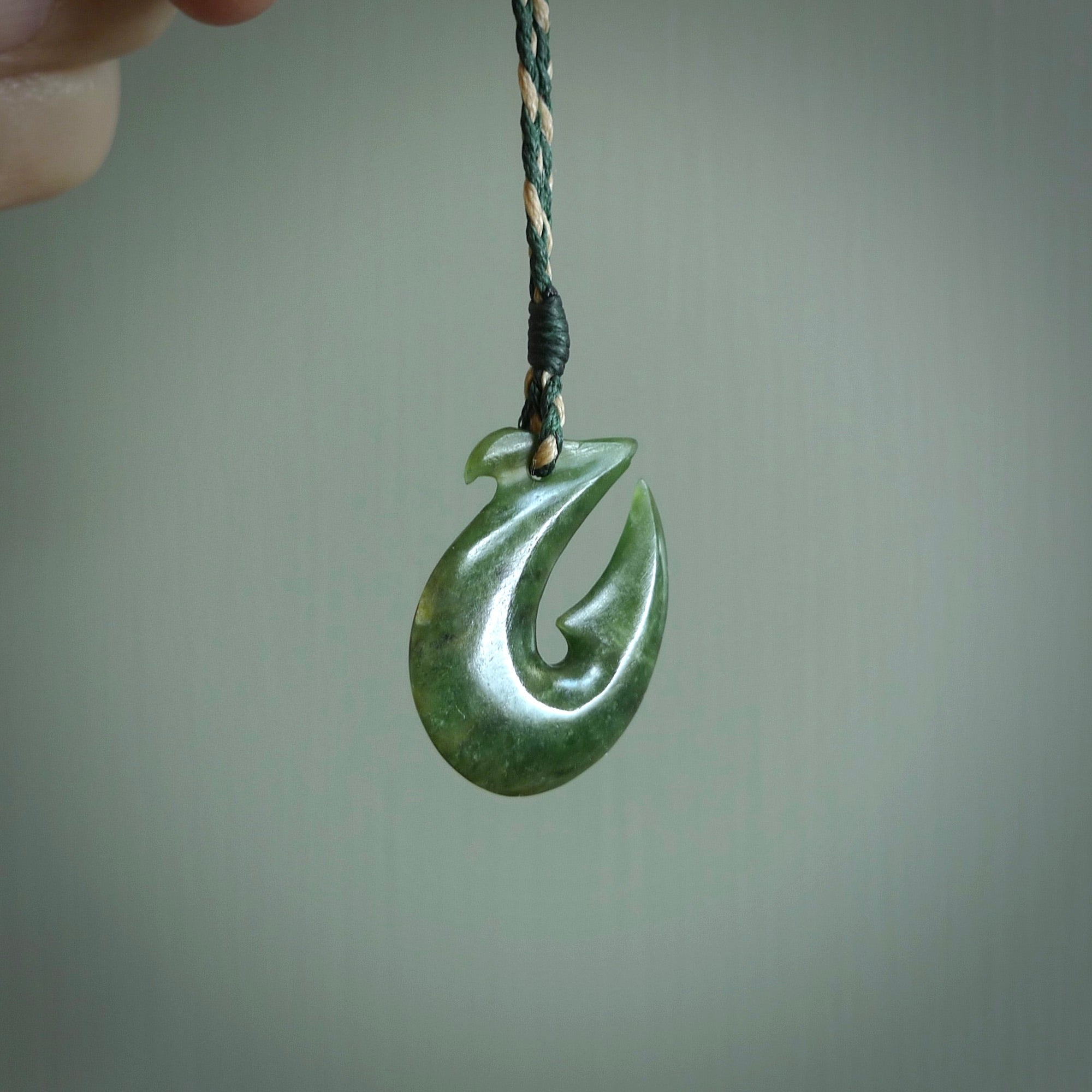 Hand carved New Zealand Jade Hook Pendant. Maori matau necklace hand carved.