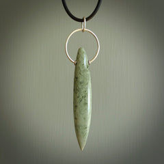 A photo of a New Zealand Jade drop pendant with sterling silver. This is a stylish statement piece - hand crafted here in New Zealand by Ana Krakosky. Unique Art to Wear. Gifts for all lovers of hand made Art to Wear.