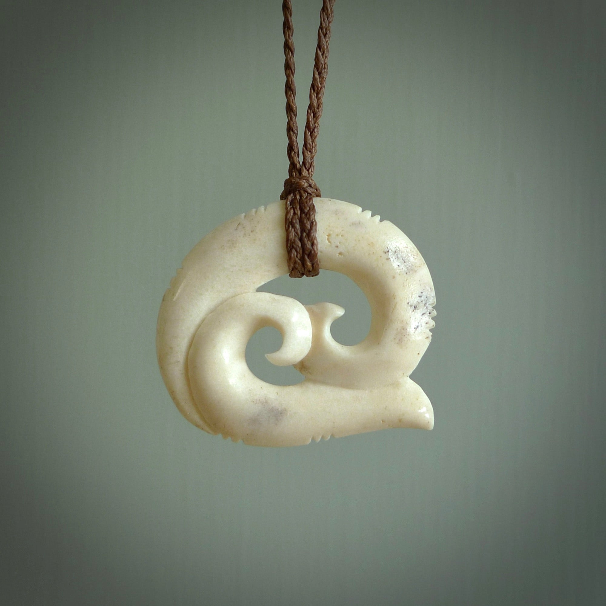 This is a wonderful, etched koru from Deer Antler. Hand carved by Anthony Bray-Heta. Order yours now on NZ Pacific at www.nzpacific.com