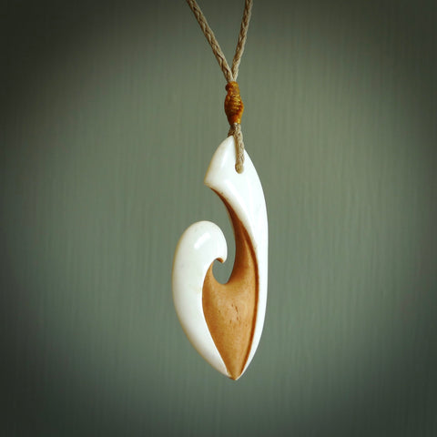 Fish hook bone carving pendant, Gift Shop Glenfield, Souvenirs, Kiwiana  Gifts, Wedding Presents