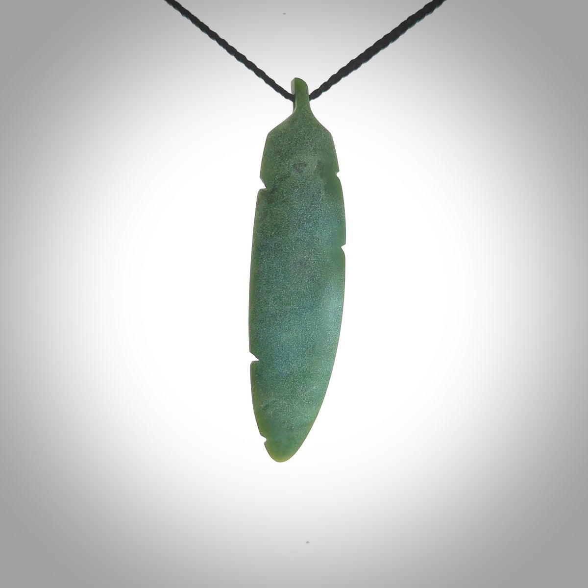 HAND CARVED JADE LARGE FEATHER PENDANT BY KERRY THOMPSON. JADE FEATHER ...