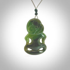 This pendant is a small jade tiki pendant. The carving shows wonderful detail on the front while the back is beautifully rounded. These are carved in Columbian Jade. The cord is adjustable in length. Provided in a woven kete pouch and shipped worldwide.