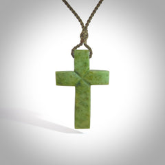 Hand carved Matte New Zealand jade cross necklace. Religious symbol pendant. Christian cross pendant for sale online. Hand crafted from New Zealand Jade Pounamu, free worldwide delivery.