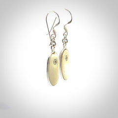 Hand carved woolly mammoth tusk earrings. Hand made by NZ Pacific for sale online.