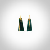 These are a pair of beautiful Goodletite Stone and gold leaf earrings. It is carved from Goodletite, ruby rock, Stone from New Zealand. It is a deep green colour with gold leaf. Hand made here in New Zealand by Ana Krakosky.