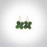 Four leaf jade drop earrings, beautifully hand made with gorgeous flair and chic design. They are fashionable and perfect for a women with style. Hand carved from a gorgeous piece of New Zealand Marsden jade with Gold Leaf inlay and Gold plated hoops - they are unique and beautiful.