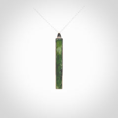 Hand carved New Zealand jade drop pendants with Sterling Silver. Contemporary drop necklaces that are hand made and will make fashionable statements around your neck. These beautiful Jade drops are in a sterling silver encasing. For sale by NZ Pacific and shipped free worldwide.