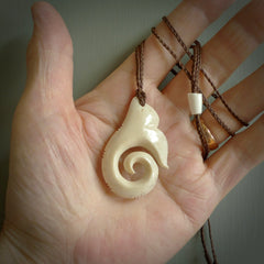 This is a wonderful, etched koru with whale tail from Deer Antler. Hand carved by Anthony Bray-Heta. Order yours now on NZ Pacific at www.nzpacific.com