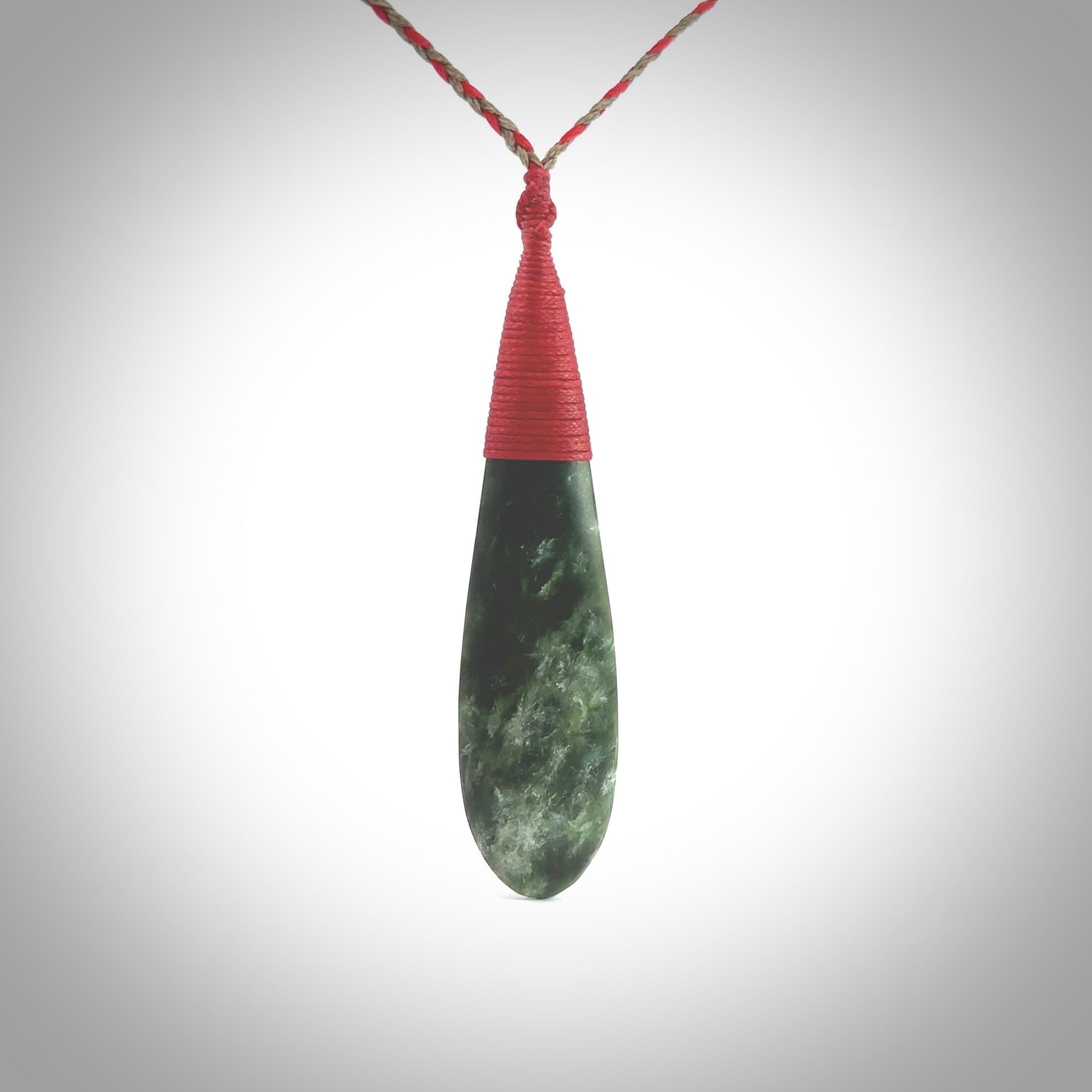 New Zealand flower jade drop pendant. Hand carved in New Zealand by NZ Pacific. Large New Zealand Jade roimata drop necklace. Drop pendant representing healing, comfort and compassion. Unisex pendants for lovers of Jade art to wear.