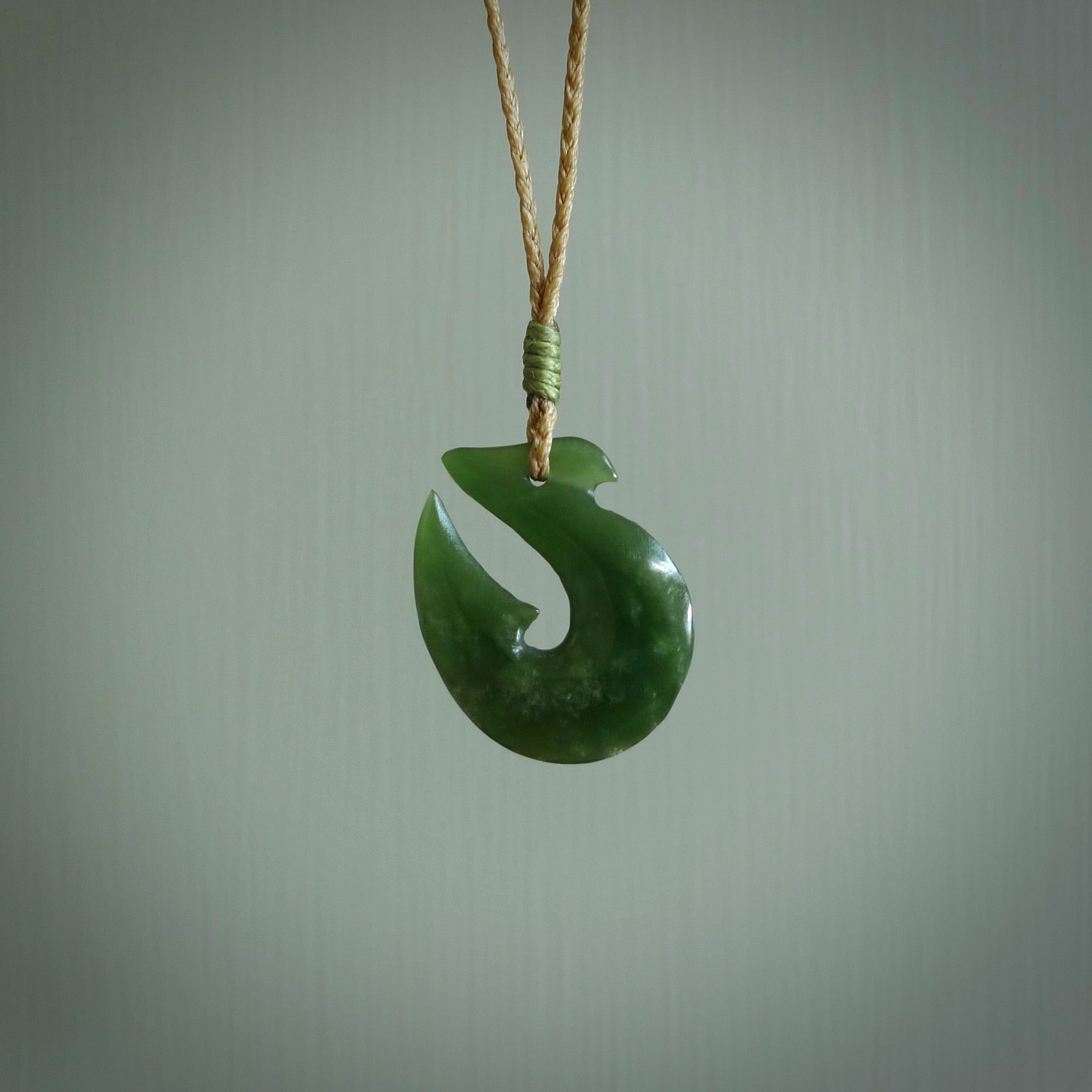 Hand carved New Zealand Jade Hook Pendant. Maori matau necklace hand carved.