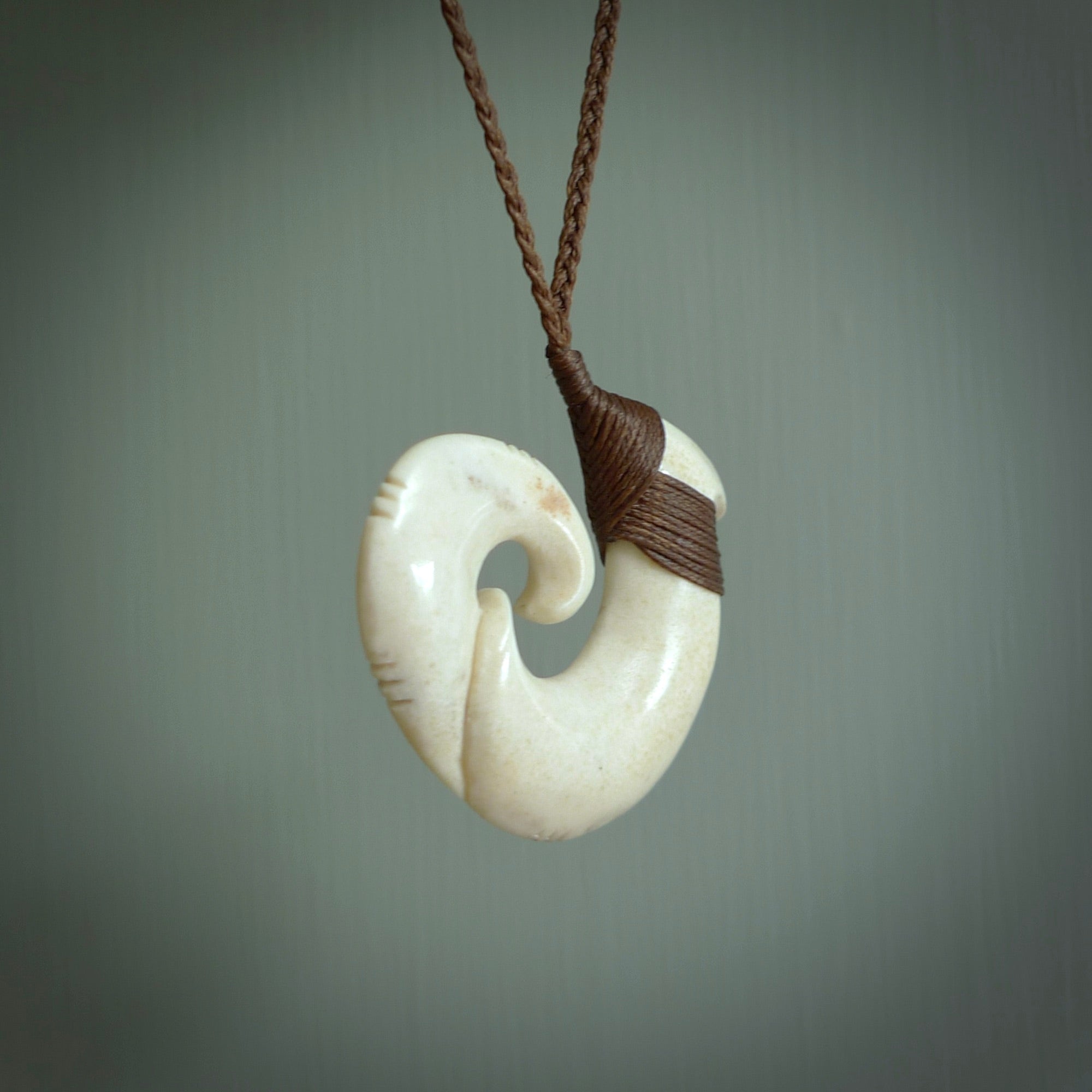 This is a wonderful, etched koru from Deer Antler. Hand carved by Anthony Bray-Heta. Order yours now on NZ Pacific at www.nzpacific.com