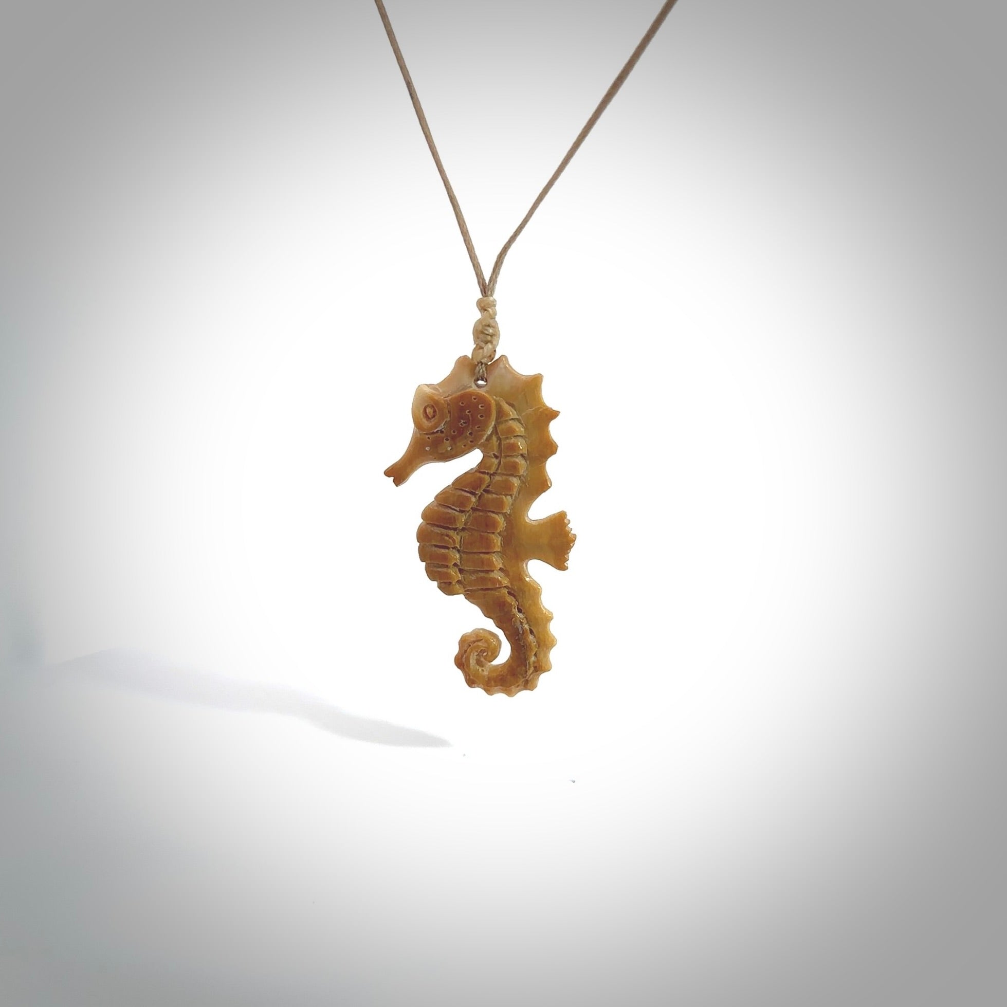 This little pendant is a beautifully carved seahorse pendant made from ancient woolly mammoth tusk. We have designed this so that it can be worn as a pendant, or as a little charm. Made by NZ Pacific and for sale worldwide on our website. Free Postage wherever you are.