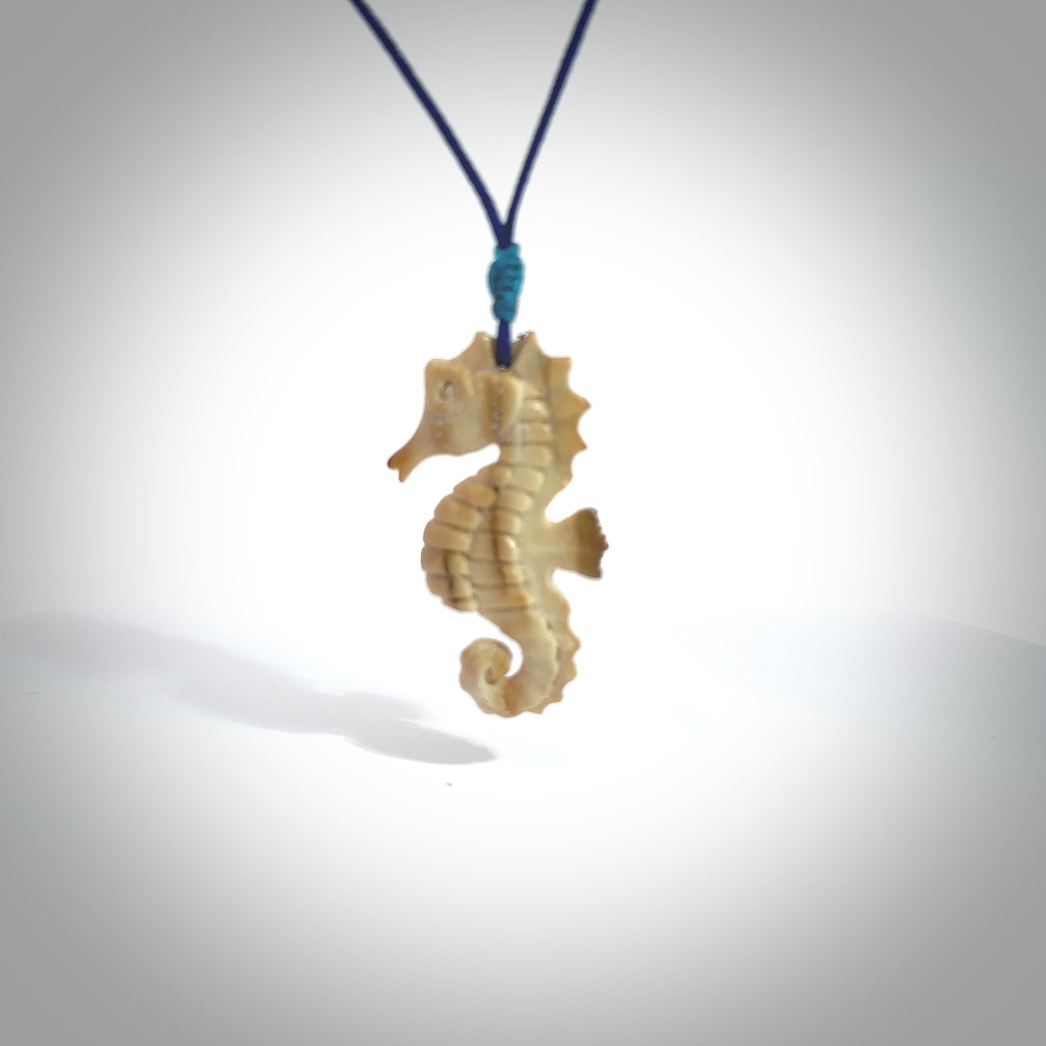 This little pendant is a beautifully carved seahorse pendant made from ancient woolly mammoth tusk. We have designed this so that it can be worn as a pendant, or as a little charm. Made by NZ Pacific and for sale worldwide on our website. Free Postage wherever you are.