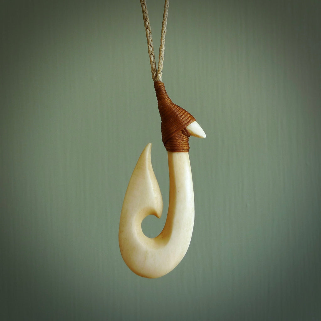 HAND CARVED BONE HOOK PENDANT. HAND MADE BONE HOOK NECKLACE. – NZ Pacific
