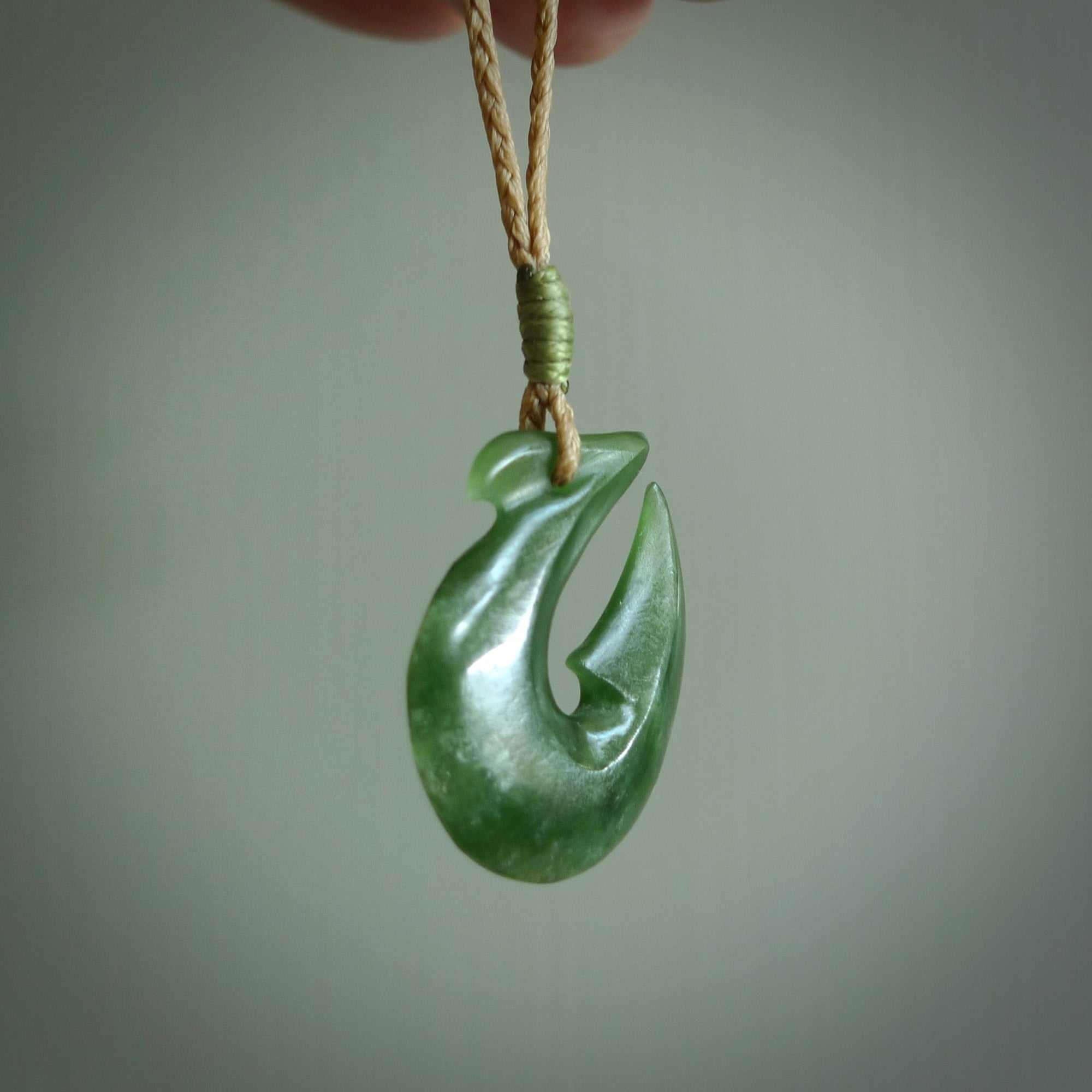 Hand carved New Zealand Jade Hook Pendant. Maori matau necklace hand carved.