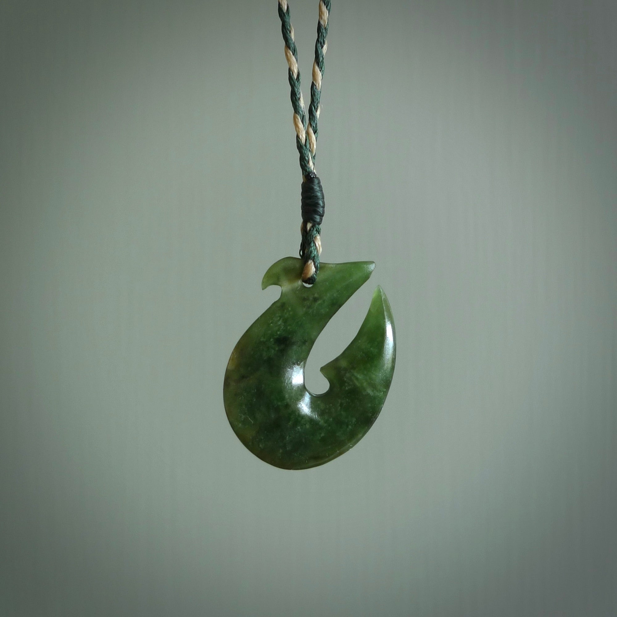 Hand carved New Zealand Jade Hook Pendant. Maori matau necklace hand carved.