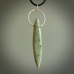 A photo of a New Zealand Jade drop pendant with sterling silver. This is a stylish statement piece - hand crafted here in New Zealand by Ana Krakosky. Unique Art to Wear. Gifts for all lovers of hand made Art to Wear.