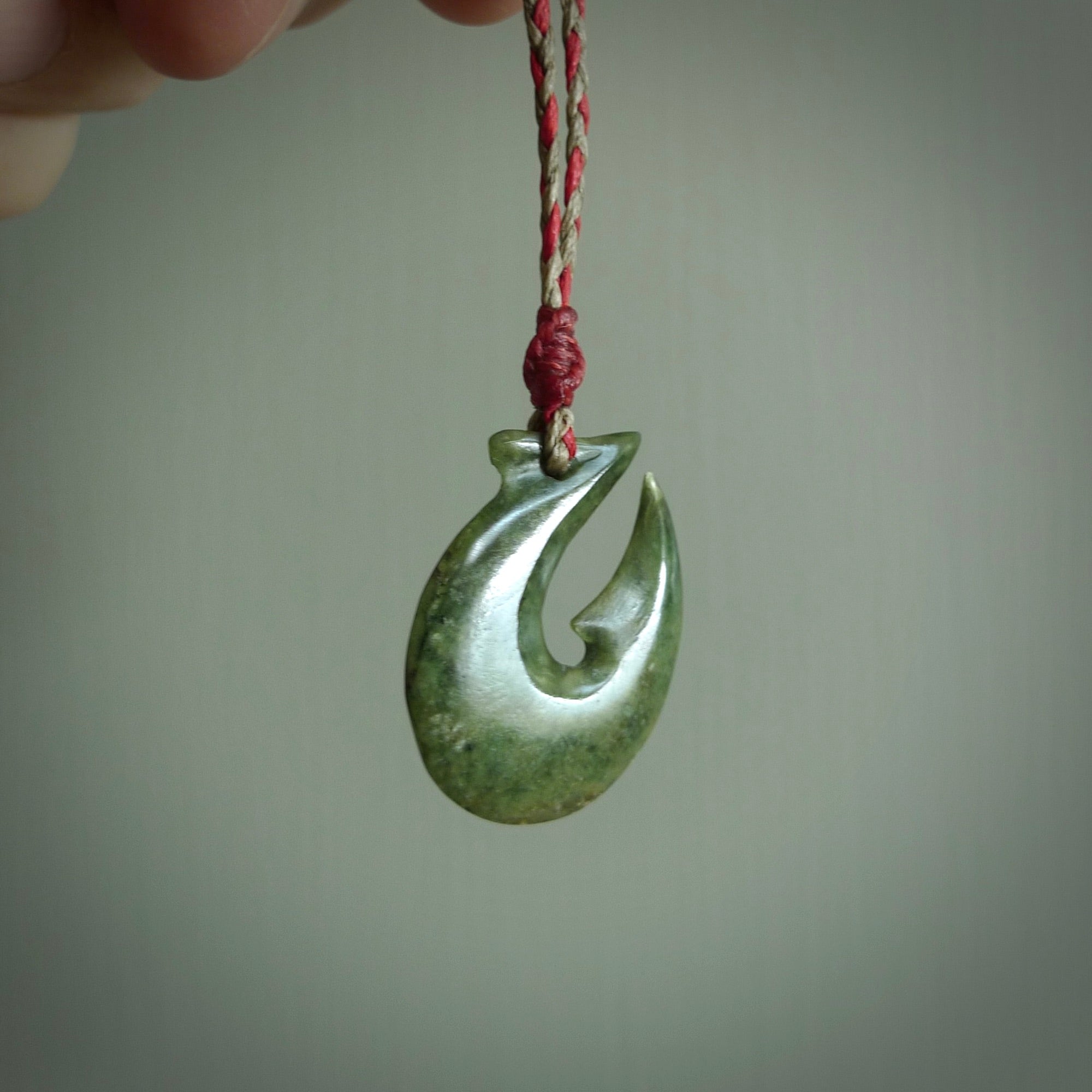 Hand carved New Zealand Jade Hook Pendant. Maori matau necklace hand carved.