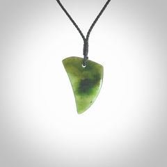 Hand carved pounamu drop pendant. Jade necklace hand made in New Zealand. A contemporary drop pendant carved from rare New Zealand jade. NZ Pacific jade jewellery for sale online.