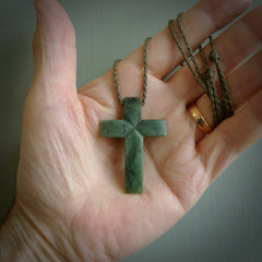 Hand carved Matte New Zealand jade cross necklace. Religious symbol pendant. Christian cross pendant for sale online. Hand crafted from New Zealand Jade Pounamu, free worldwide delivery.