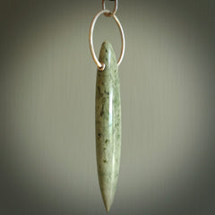 A photo of a New Zealand Jade drop pendant with sterling silver. This is a stylish statement piece - hand crafted here in New Zealand by Ana Krakosky. Unique Art to Wear. Gifts for all lovers of hand made Art to Wear.