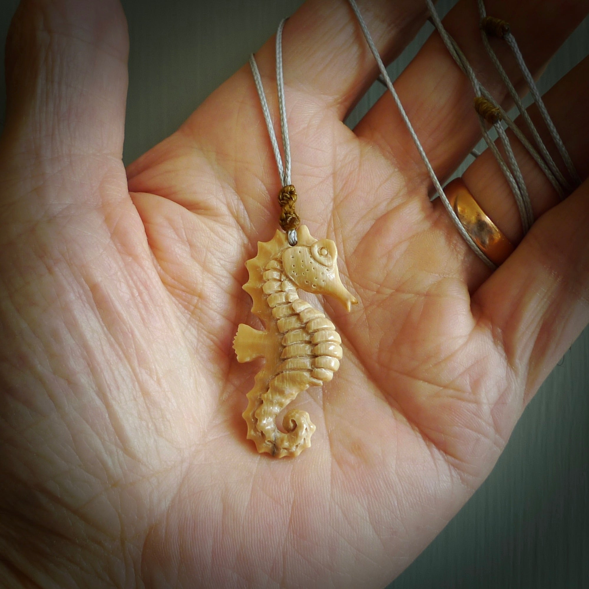 This little pendant is a beautifully carved seahorse pendant made from ancient woolly mammoth tusk. We have designed this so that it can be worn as a pendant, or as a little charm. Made by NZ Pacific and for sale worldwide on our website. Free Postage wherever you are.