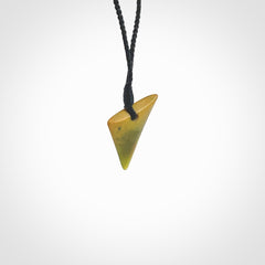 Hand carved small sized pounamu drop pendant. Jade necklace hand made in New Zealand. A contemporary drop pendant carved from rare New Zealand jade. NZ Pacific jade jewellery for sale online.