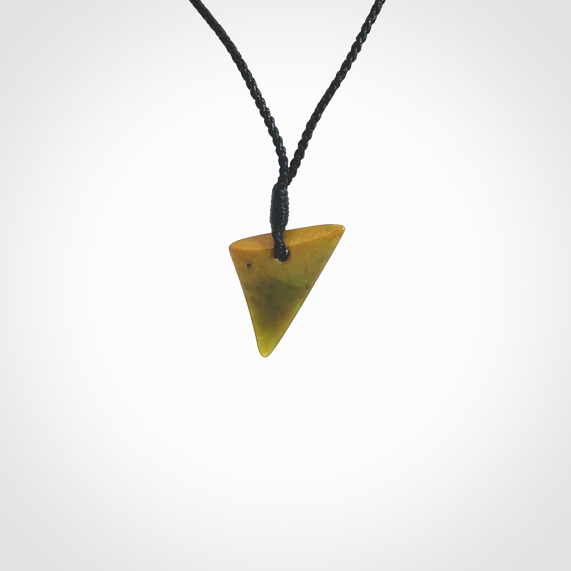 Hand carved small sized pounamu drop pendant. Jade necklace hand made in New Zealand. A contemporary drop pendant carved from rare New Zealand jade. NZ Pacific jade jewellery for sale online.