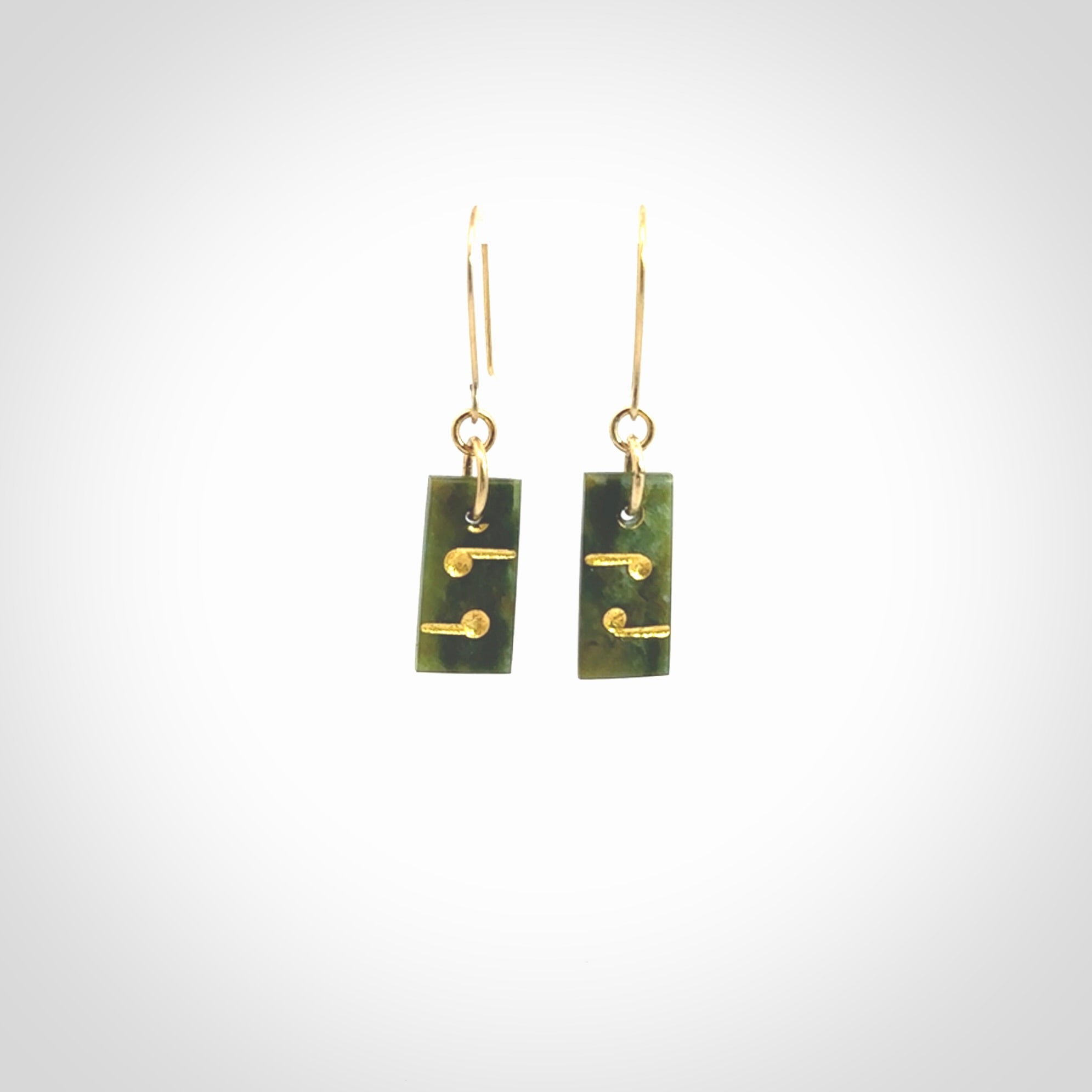 These small drop earrings are beautifully hand made with gorgeous flair. They are fashionable and perfect for a women with style. Hand carved from a gorgeous piece of New Zealand Marsden jade with Gold leaf and gold plated hooks - they are elegant and beautiful.