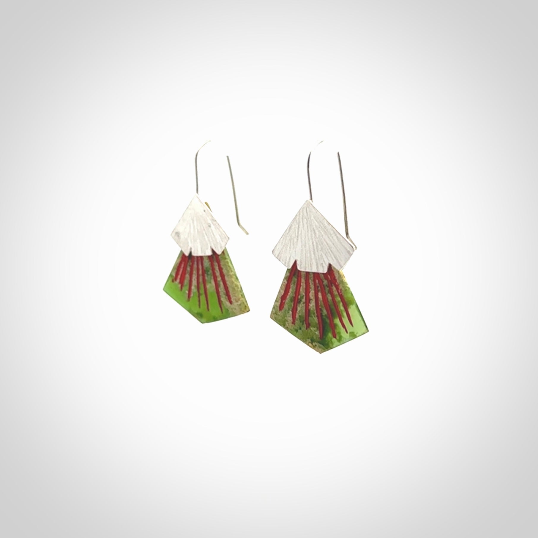 Hand made New Zealand Jade Rata drop earrings with sterling silver and red enamel. Hand crafted by Ana Krakosky. Beautiful Jade earrings hand made in New Zealand. One pair only. Provided in a woven kete pouch.