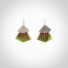 Hand made New Zealand Jade Rata drop earrings with sterling silver and red enamel. Hand crafted by Ana Krakosky. Beautiful Jade earrings hand made in New Zealand. One pair only. Provided in a woven kete pouch.