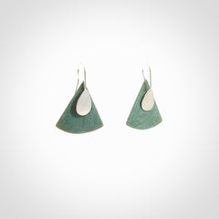 These modern jade drop earrings are beautifully hand made with gorgeous flair and chic design. They are fashionable and perfect for a women with style. Hand carved from a gorgeous piece of New Zealand Inanga jade with sterling silver hooks - they are elegant and beautiful.