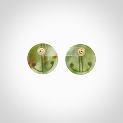 These large round stud earrings are beautifully hand made in New Zealand Jade with Gold Enamel. They have koru designs are are gorgeous. They are fashionable and perfect for a women with style. Hand carved from a gorgeous piece of New Zealand Marsden jade with Gold leaf and gold plated studs - they are elegant and beautiful.