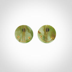 These large round stud earrings are beautifully hand made in New Zealand Jade with Gold Enamel. They have koru designs are are gorgeous. They are fashionable and perfect for a women with style. Hand carved from a gorgeous piece of New Zealand Marsden jade with Gold leaf and gold plated studs - they are elegant and beautiful.