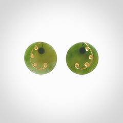 These large round stud earrings are beautifully hand made in New Zealand Jade with Gold Leaf Enamel. They have koru designs are are gorgeous. They are fashionable and perfect for a women with style. Hand carved from a gorgeous piece of New Zealand Marsden jade with Gold leaf and gold plated studs - they are elegant and beautiful.