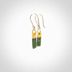 These small drop earrings are beautifully hand made with gorgeous flair. They are fashionable and perfect for a women with style. Hand carved from a gorgeous piece of New Zealand Marsden jade with Gold leaf and gold plated hooks - they are elegant and beautiful.