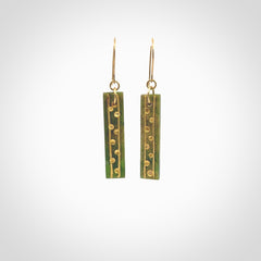 These large drop earrings are beautifully hand made with gorgeous flair. They are fashionable and perfect for a women with style. Hand carved from a gorgeous piece of New Zealand Marsden jade with Gold leaf and gold plated hooks - they are elegant and beautiful.