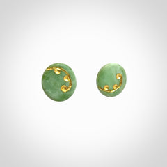 These round stud earrings are beautifully hand made in New Zealand Jade with Gold Leaf Enamel. They have fern leaf designs are are gorgeous. They are fashionable and perfect for a women with style. Hand carved from a gorgeous piece of New Zealand jade with Gold leaf and gold plated studs - they are elegant and beautiful.