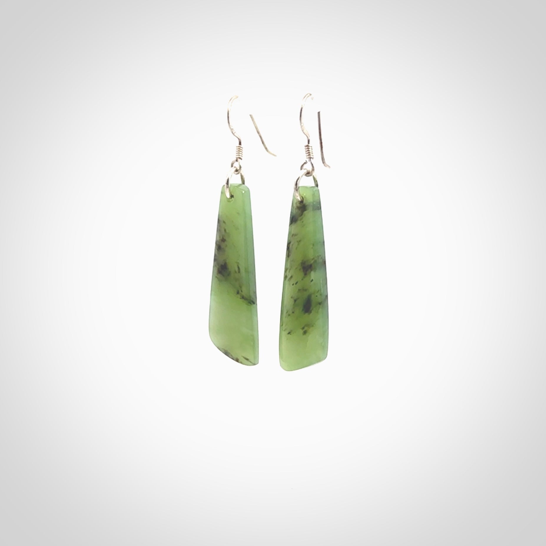 Hand carved New Zealand Jade drop earrings. New Zealand Jade earrings.