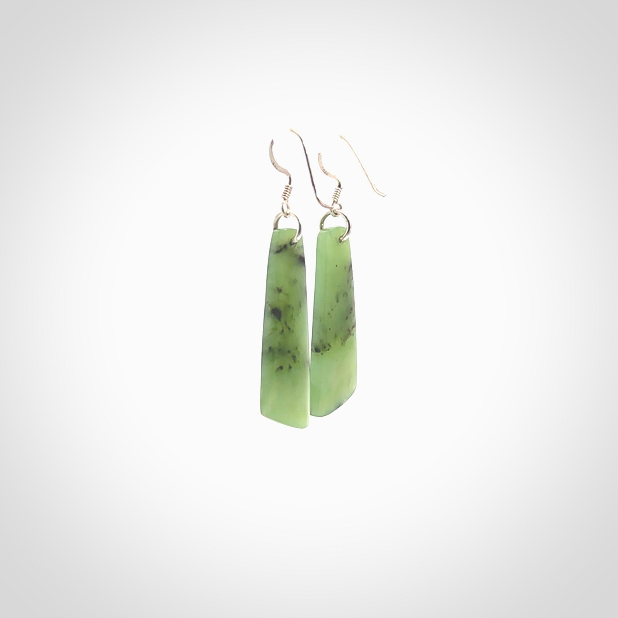 Hand carved New Zealand Jade drop earrings. New Zealand Jade earrings.